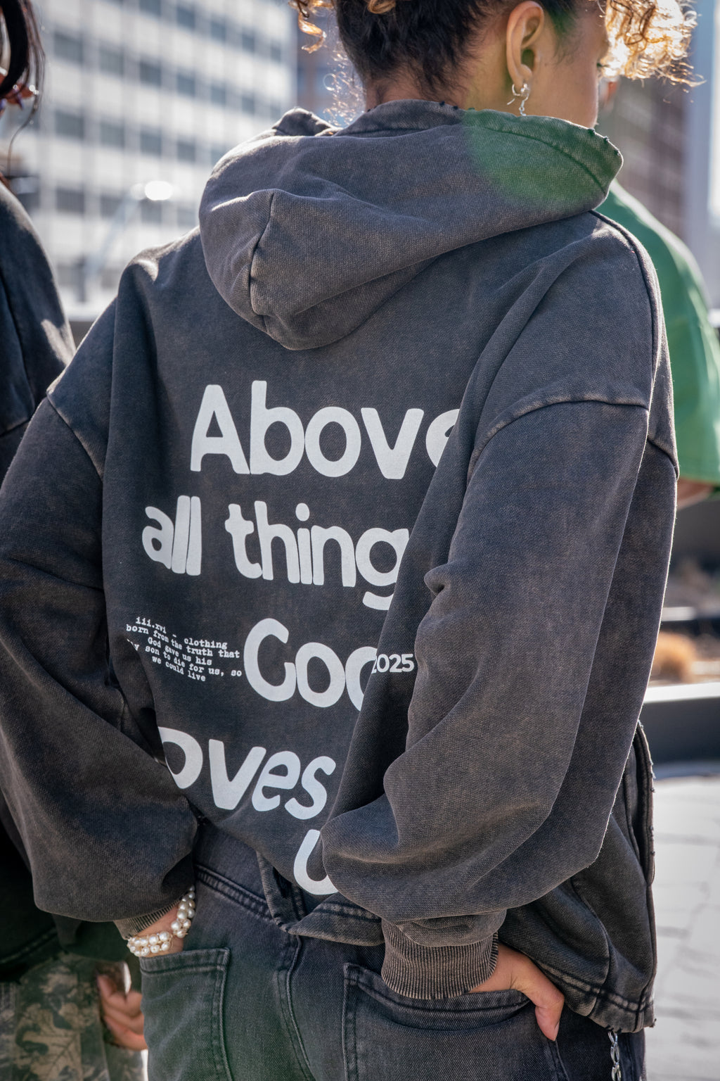 "ABOVE ALL" VINTAGE WASHED BLACK HOODIE